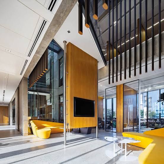 Double-height interior with feature staircase